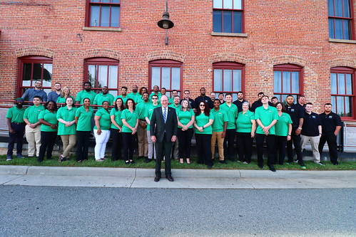 Virginia's Secretary of Commerce & Trade, the Honorable Brian Ball, stands with SVHEC's largest group of job training program completers.