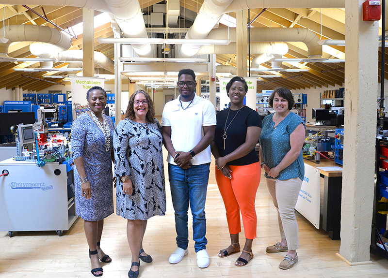 Group photo of five SVHEC staff members who worked on the NCCER accreditation process.